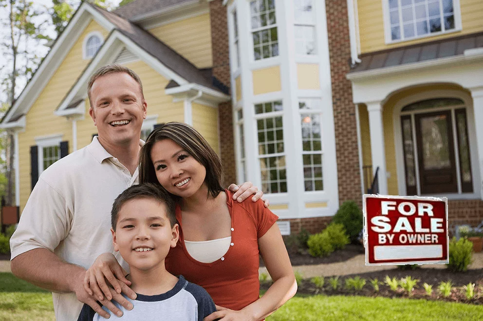 Happy family infront of the house